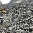 A couple and a baby were rescued and taken to hospital after 46 homes in the Chinese village of Xinmo were swallowed when the side of a mountain collapsed