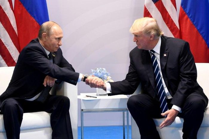 US President Donald Trump -- shown here with Russia's President Vladimir Putin at the G20 summit in Germany in July -- has long argued for better ties with Moscow