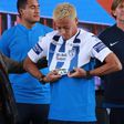 Pachuca's new footballer, Japanese Keisuke Honda, puts his new jersey on next to the team's president Jesus Martinez, during his official presentation, at the Football University on the outskirts of Pachuca, Hidalgo State, Mexico, on July 18, 2017