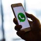 WhatsApp icon on a phone screen