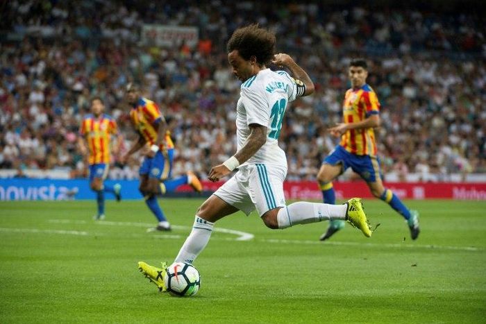 Real Madrid's defender Marcelo prepares to kick the ball during the Spanish league football match against Valencia August 27, 2017