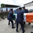 Pallbearers carry the coffin of football star Cheick Tiote during a funeral ceremony on June 18, 2017 in Abidjan