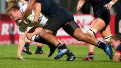 England's Sarah Bern (L) is tackled by France's Safi N'Diaye during the Women's Rugby World Cup 2017 semi-final match on August 22, 2017