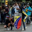 Opposition demonstrators block an avenue during an anti-government protest, in Caracas on June 29, 2017