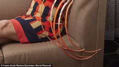 ___7320643___2017___9___15___13___43FACB5F00000578-4859508-Her_nails_each_of_which_is_just_under_two_foot_long_have_earned_-a-18_1504730840638