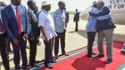 President Uhuru Kenyatta hugs ODM leader Raila Odinga