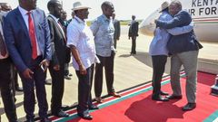 President Uhuru Kenyatta hugs ODM leader Raila Odinga