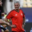 Manchester United's manager Jose Mourinho (R) looks on during training session in Skopje on August 7, 2017