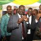 Meru Governor Peter Munya and Nasa leader Raila Odinga chew of Miraa at the Meru exhibition during the last day of the third Annual Devolution Conference in Meru on April 22, 2016.