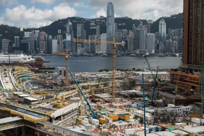 The West Kowloon terminus is in the heart of semi-autonomous Hong Kong, on its famous harbourfront, not near the boundary with China that lies further north