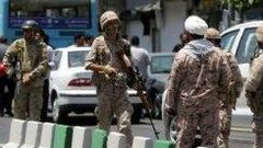 Members of the Iranian Revolutionary Guard secure the area outside parliament during an attack on the complex in Tehran on June 7, 2017