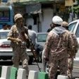 Members of the Iranian Revolutionary Guard secure the area outside parliament during an attack on the complex in Tehran on June 7, 2017