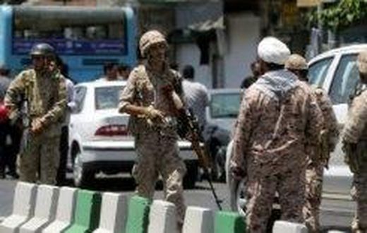 Members of the Iranian Revolutionary Guard secure the area outside parliament during an attack on the complex in Tehran on June 7, 2017