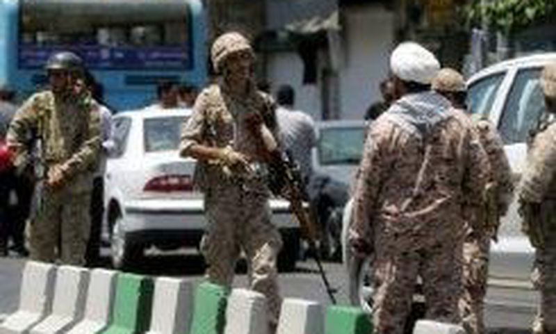 Members of the Iranian Revolutionary Guard secure the area outside parliament during an attack on the complex in Tehran on June 7, 2017