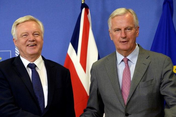Britain's Brexit Minister David Davis (L) and European Union Chief Negotiator in charge of Brexit negotiations Michel Barnier pictured prior to their meeting at the European Union Commission headquarter in Brussels on July 17, 2017