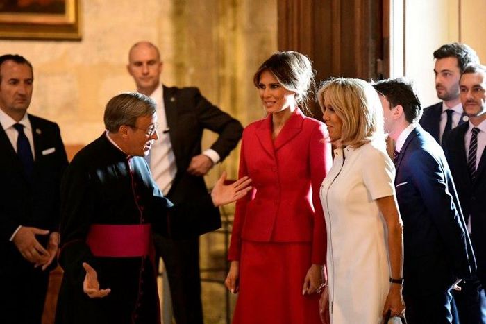 US First Lady Melania Trump and her French counterpart Brigitte Macron took in the highlights of Notre Dame cathedral in Paris with its rector Patrick Chauvet