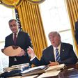 In February, US President Donald Trump (2nd L) and Intel CEO Brian Krzanich (L) met in the Oval Office -- this week, Krzanich left his advisory panel on manufacturing