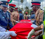 KDF officers carry the casket bearing the body of former Prime Minister Raila Odinga