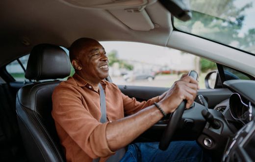 A person driving a car