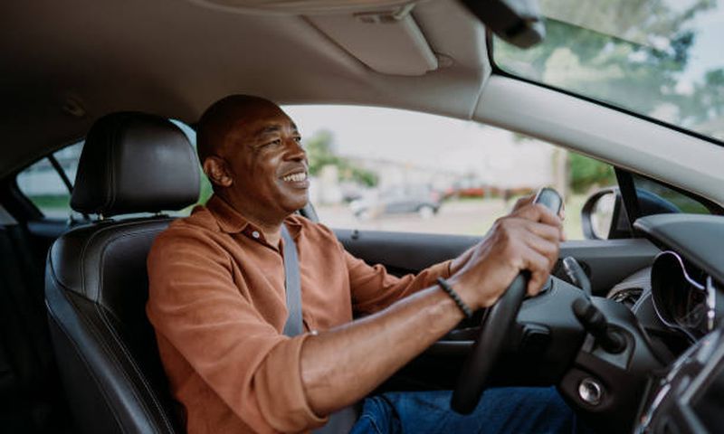 A person driving a car