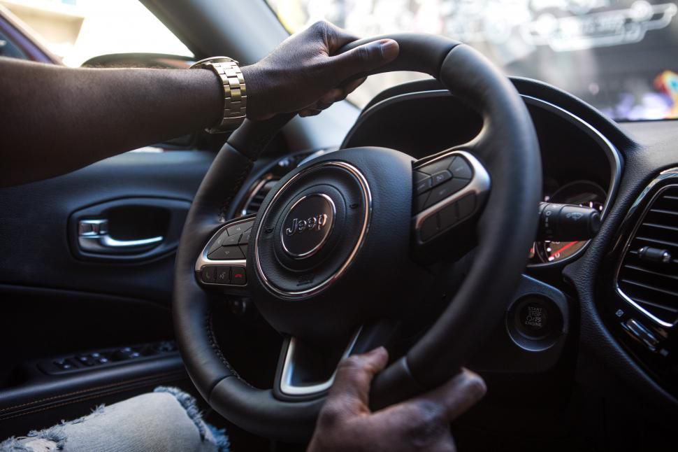 A person driving a car