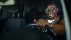 A person driving a car