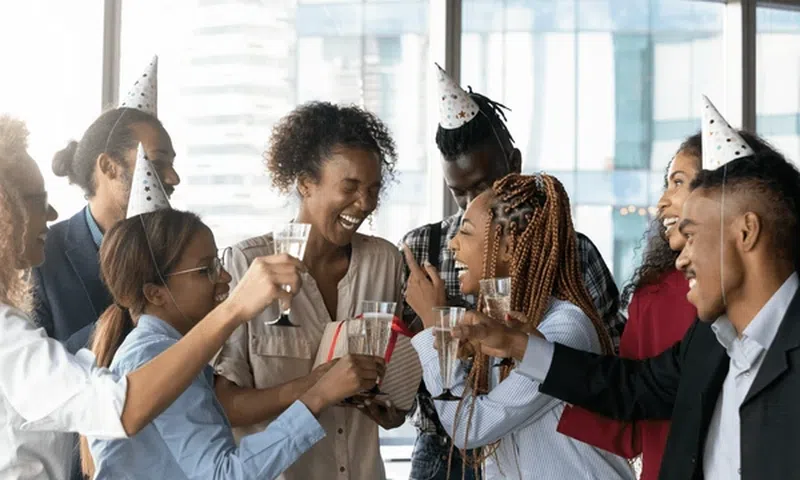 People enjoying an office party