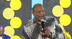 Former President Uhuru Kenyatta speaking during the burial of his cousin, Kibathi Muigai