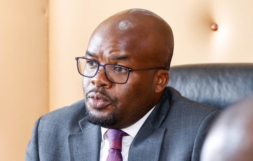 Principal Secretary for Internal Security Dr. Raymond Omollo chairs a meeting in his office