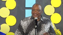 Former President Uhuru Kenyatta speaking during the burial of his cousin, Kibathi Muigai