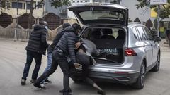 Plainclothes officers arrest a man in Nairobi, Kenya