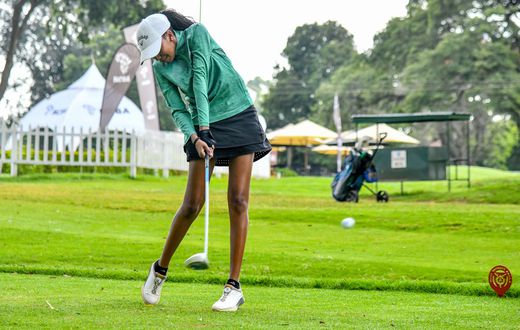 Junior Golfer Wanjiku Mathu plays a tee shot during 2025 NCBA Golf Series qualifying leg at Karen Country Club