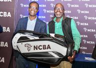 Overall Winner at the 2025 NCBA Golf Series qualifying leg at Karen CC Gilbert Maina is awarded by NCBA Group Managing Director John Gachora