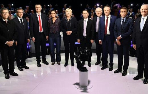Ten of the eleven candidates before the debate -- autoworker Philippe Poutou refused to take part in the family photo