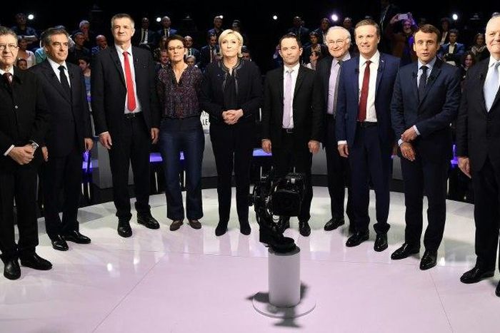 Ten of the eleven candidates before the debate -- autoworker Philippe Poutou refused to take part in the family photo