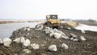 'Breaches Everywhere': Flooding Bursts Midwest Levees, and Tough Questions Follow