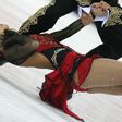 Tatiana Navka and Roman Kostomarov perform at the 2006 Winter Olympics in Turin