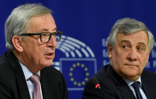 EU Commission President Jean-Claude Juncker (L) at a press with President of the EU Parliament Antonio Tajani (R) in Brussels on March 1, 2017