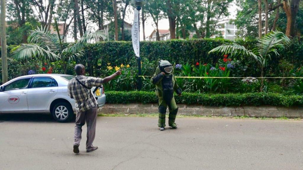 A security officer prepares to detonate some of the explosives left behind by Al Shabaab terrorists at Dusit Hotel