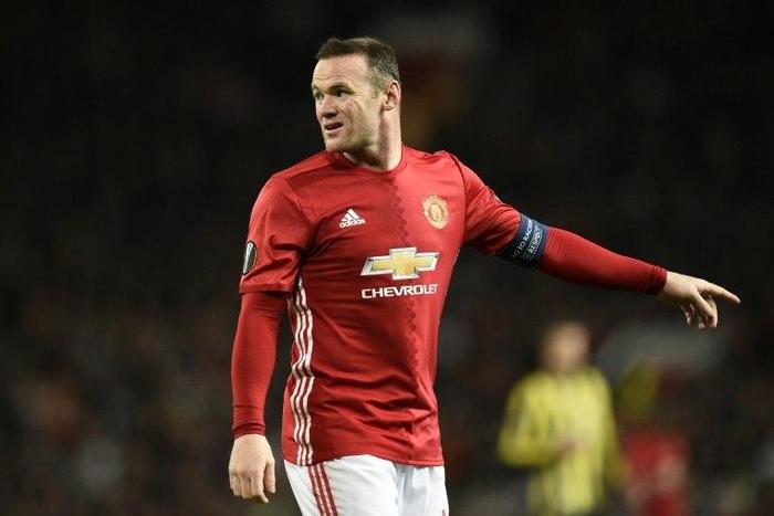 Manchester United's English striker Wayne Rooney upset with former team-mate Michael Owen for expressing support for Liverpool on Twitter