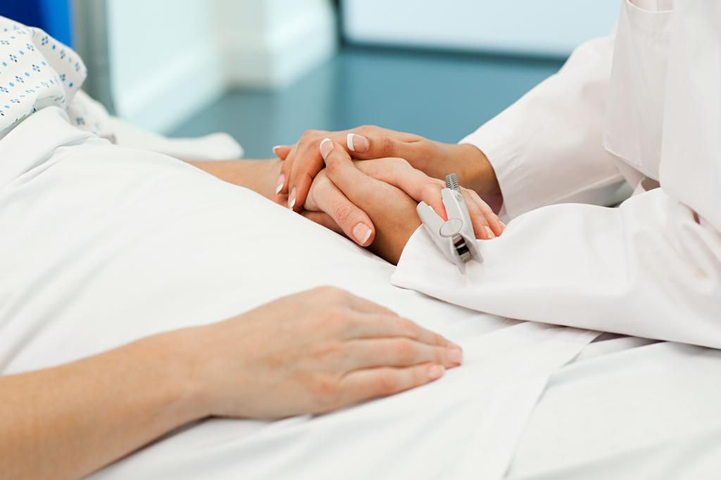 Female patient with doctor