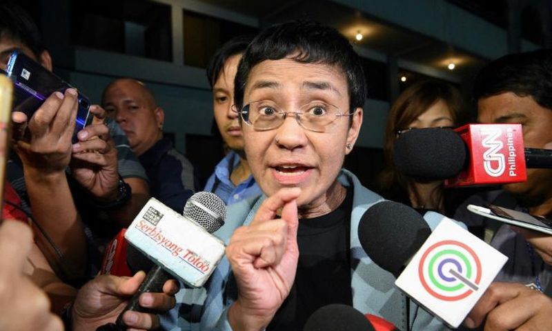 Philippine journalist Maria Ressa managed to speak to reporters at the National Bureau of Investigation after her arrest in Manila Wednesday