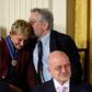 US actor Robert De Niro (R) hugs actress and comedian Ellen DeGeneres after she was presented with the Presidential Medal of Freedom, at the White House