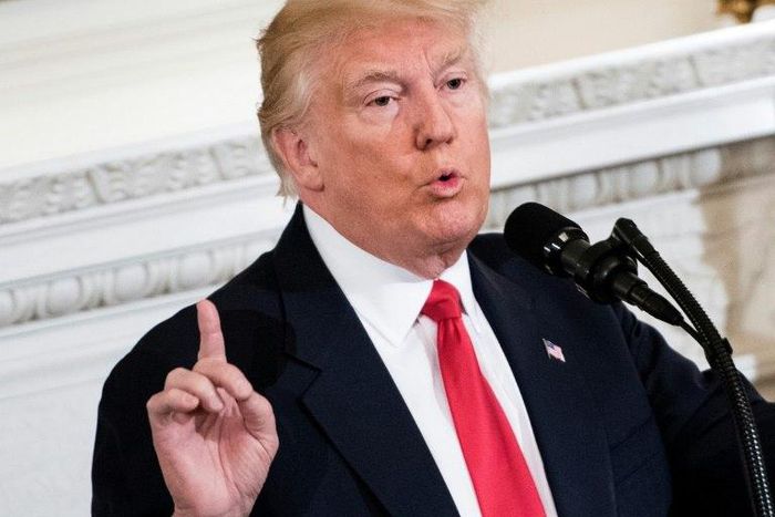 US President Donald Trump speaks to members of the National Governors Association and his administration in the State Dining Room of the White House on February 27, 2017