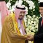 Saudi Arabia's King Salman bin Abdul Aziz (L) held talks with Indonesian President Joko Widodo (R) in Bogor, West Java, on March 1, 2017