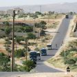 Syrian civilians and rebels, who were evacuated from the Qabun district in northeast Damascus, arrive by bus at a temporary camp in the northern countryside of Idlib province on May 15, 2017