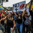 Venezuelan opposition activists protest in Caracas, on May 7, 2017