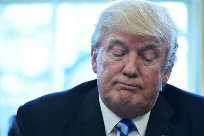 US President Donald Trump pauses as he speaks from the Oval Office of the White House in Washington, DC, on March 24, 2017