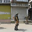 Indian paramilitary troopers patrol in Srinagar during a one-day strike called by Kashmiri separatists against Prime Minister Narendra Modi's visit