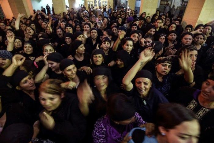 Masked gunmen attacked a bus of Coptic Christians south of the Egyptian capital, killing at least 28 people